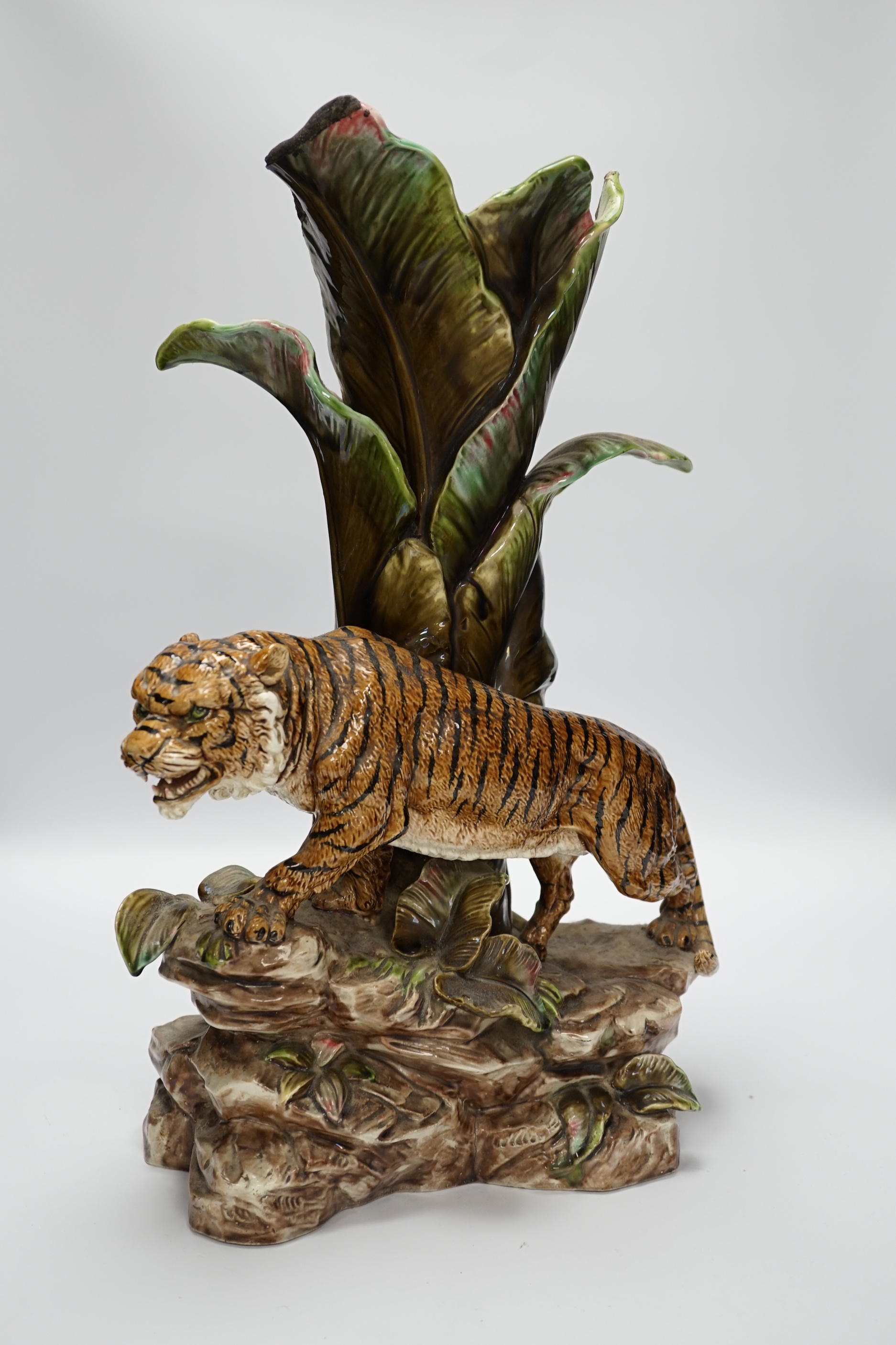 An early 20th century Continental majolica tiger vase, impressed 2032 to the base, 47cm high